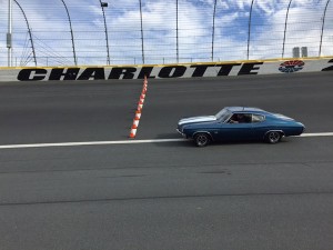 Collision repair instructor Roy H. Klinger takes the award-winning Chevelle for a spin on the famed Charlotte Motor Speedway.