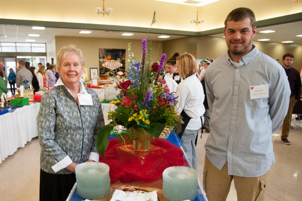 Pat Kaczmarek, of the Duboistown Garden Club, takes a photo with Samuel G. Bubb, a landscape/horticulture technology: landscape emphasis major from Williamsport, who received the club’s scholarship for 2014-15.
