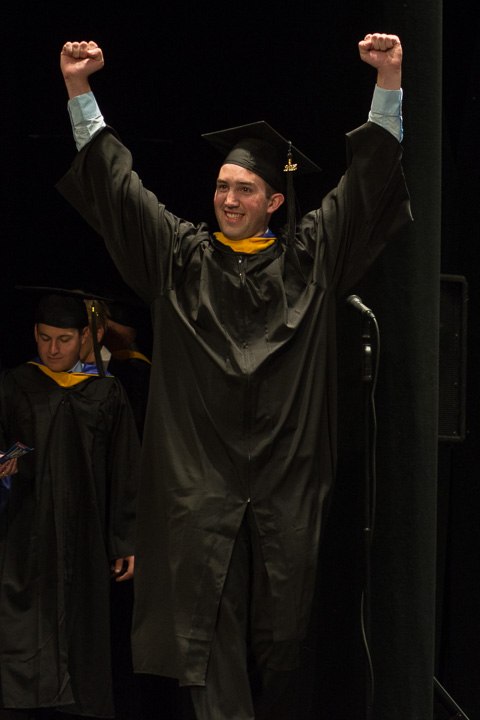 A triumphant Matthew R. Clugston, of Philadelphia, earning a bachelor's degree in residential construction technology and management: building construction technology concentration 