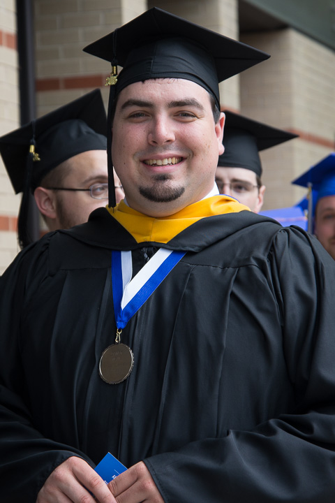 Derek E. Teay, of Northampton, a campus leader among IT students, attains his degree in software development and information management.