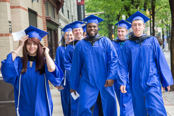 Seeming superheroes keep their date with a diploma.