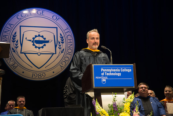 Collision repair instructor Roy H. Klinger, who has helped take the automotive restoration technology major into national prominence, expresses his gratitude for his Excellence in Teaching award.