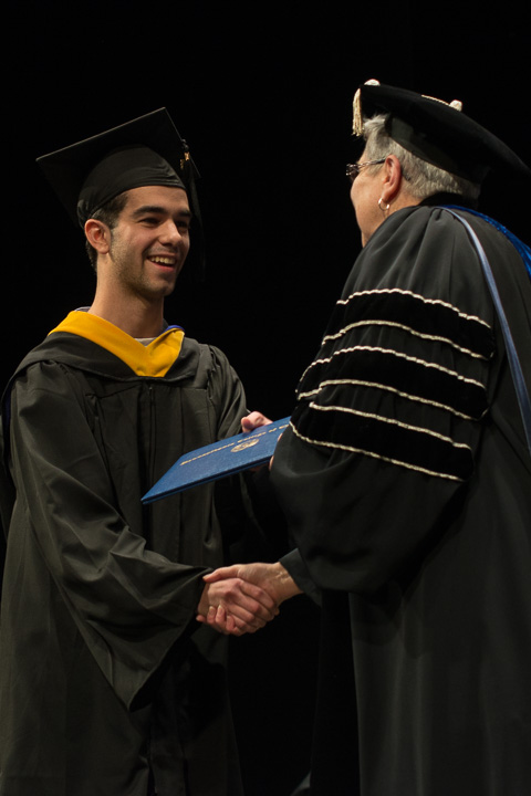 A Wildcat student-athlete – golfer Nicholas J. Krupka, of Allentown – receives his degree in industrial and human factors design.
