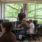 Framed by a backdrop of Earth Science Center greenery, Walter J. Shultz Jr., director of the Office of Instructional Technology, leads a breakout session on "Online Tools to Encourage Student Engagement."