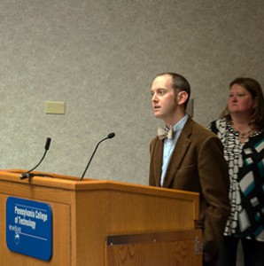 Bradley M. Webb, director of student affairs administration, with Shelley L. Moore, assistant director of career services, presides over the evening's program.