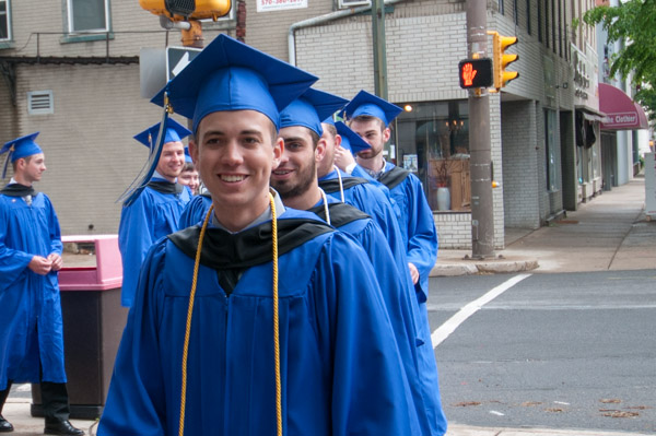 Happy Saturday morning graduates head to the Community Arts Center.