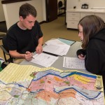 With a map of Greater Williamsport nearby, Snyder and Christina R. Inman, of Sugar Grove, keep on top of the situation.