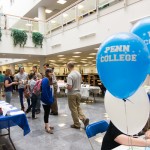 Student leaders mingle amid the wares.