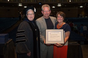 Gilmour with Humanitarian/Citizenship Award recipients Joseph H. and Barbara A. Reynolds