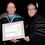 Dr. Urosevich receives the Veronica M. Muzic Master Teacher Award from President Davie Jane Gilmour during May 2008 commencement exercises.