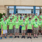 Campers and their mentors pause for a group shot in front of the ATHS after lunch on their final day.