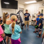 Campers are introduced to weight training with the college's Precor machines.