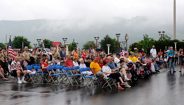 Although inclement weather (including a tornado watch that expired a half-hour before the march formed near West Fourth and Campbell streets) affected turnout, enthusiastic participants still rallied 'round the flag.