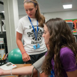 An important part of a fitness assessment, campers record one another’s blood pressure in the exercise science major.