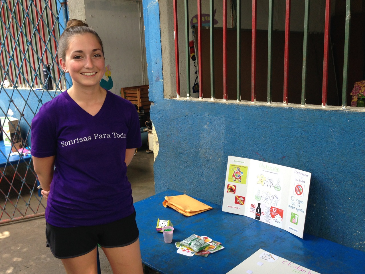 Claudia N. Naylor staffs a display on nutrition and oral health during a community health fair.