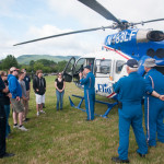 Emergency medical services students listen attentively to practical information about Life Flight landings.