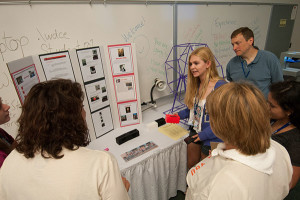 At Penn College’s SMART Girls summer camp, Amanda Kelly – of Holy Spirit High School, Absecon, New Jersey – shows the 3-D-printed project she and her teammates developed. The girls pitched their fictitious business (Sirens of Sound) and product, a non-electrical amplifier for smartphones, to camp mentors as part of a “Shark Tank”-like showcase.