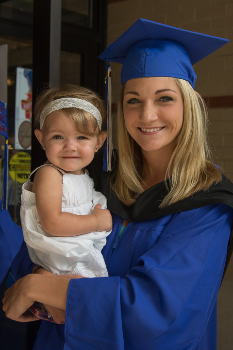 Jemme A. Hart, of Jersey Shore, a health arts: practical nursing emphasis graduate, celebrates with her daughter. 