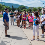 Presidential Student Ambassador Daniel T. Kreger, a building science and sustainable design: architectural technology major from Morris, leads PFEW students and parents on a campus tour.