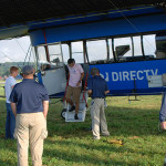 Students exit the gondola after their access to a high-profile aircraft.
