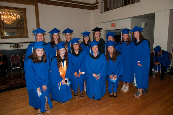 The surgical technology Class of 2015 with clinical director – and a Saturday graduate with a bachelor’s degree in nursing – Elizabeth S. Gizenski.