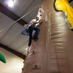 An inflatable  climb is among the night's attractions.