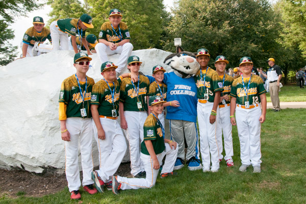 The Midwest team grabs a photo with two Penn College icons – the Wildcat and 