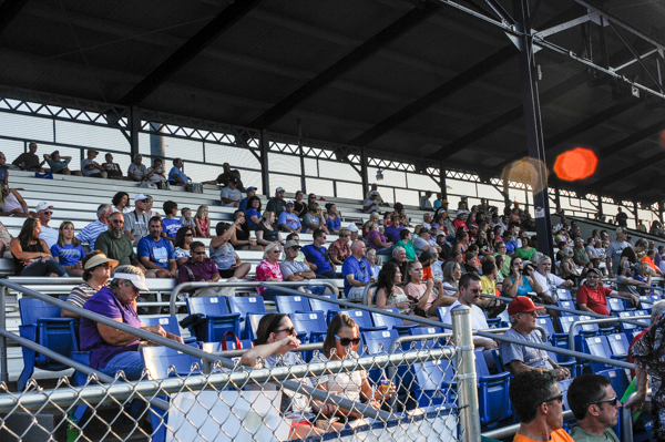 Fans, many in Penn College attire, watch the action.