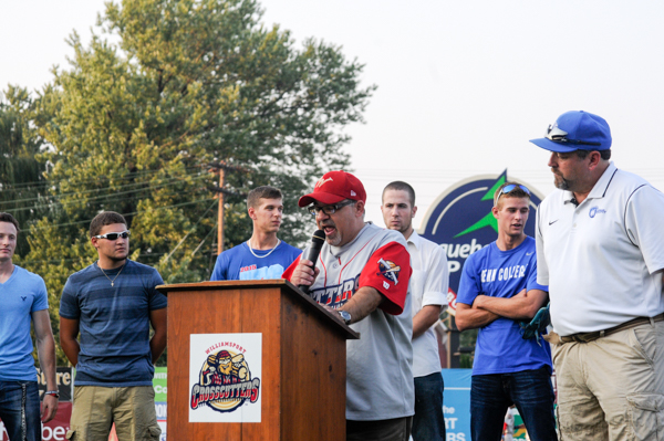 Coach Chris Howard (right) and his NEAC champion Penn College Wildcats are introduced by Gabe Sinicropi Jr., the Crosscutters' vice president of marketing and public relations.