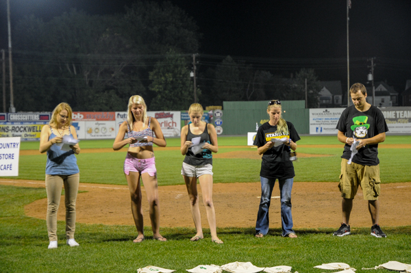 Students vie for a windfall in a postgame contest ...
