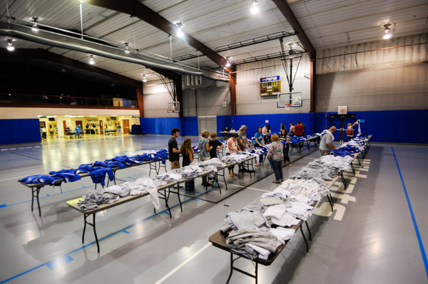 A range of Wildcat athletic gear fills sale tables in the Field House.