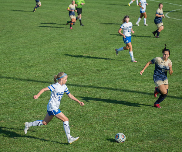 In full stride against Gallaudet University on Friday is Christina Weber (12), who scored a Wildcat goal en route to a 4-0 win.