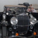 The group peeks inside the Duesenberg, on loan from the William E. Swigart Jr. Automobile Museum in Huntingdon for light service work and detailing.