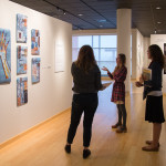 Local art teachers, including WAHS' Andrea McDonough-Varner (center), discuss the works “at hand” in The Gallery at Penn College.