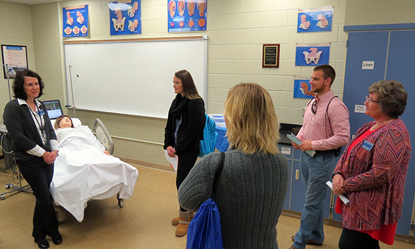 Terri A. Stone (left), assistant professor, shares insight into the interactive learning environment afforded the college's nursing majors.