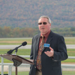 Against fall-colored foothills behind the runway, Brett A. Reasner, dean of transportation and natural resources technologies, joined President Davie Jane Gilmour in welcoming guests.