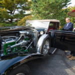 A doozy of a Duesenberg – complete with a Lycoming Engine – greeted the group on their way to lunch at Le Jeune Chef Restaurant. Michael Kraft, senior vice president and general manager of Lycoming Engines, chats with Vanessa Mathurin, of Philadelphia, an automotive restoration technology student on hand to offer a historical lesson on the classic 1929 car. 