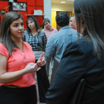 Kayla A. Gross, an applied management student from Danville, talks with 2011 business administration: banking and finance alumna Amy (Dibble) Chervinsky.