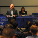 Chris Frantz, ’05, business management, talks to an attentive audience that filled the SASC presentation room.