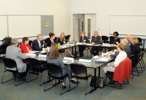 A "roundtable" discussion in College Avenue Labs elicits a variety of viewpoints on economic and community development.