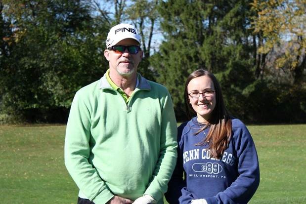 Aviation alumnus Walter V. Gower, assistant dean of transportation and natural resources technologies, hits the links with daughter Elyse M., a 2011 graduate in business administration: management concentration.