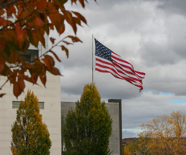 On a blustery autumn day, that star-spangled banner yet waves.
