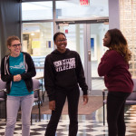 Keeping the mood light while learning a serious lesson are (from left) student leaders Jessica R. Wiegand, Kacie L. Weaver and Chesnya I. Cherulus.