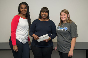 Calvetta A. Walker (center), assistant professor of reading, chose students Chanelle Johnson (left) and Heidi M. Elliott to receive $250 scholarships from the Pennsylvania Association of Developmental Educators.