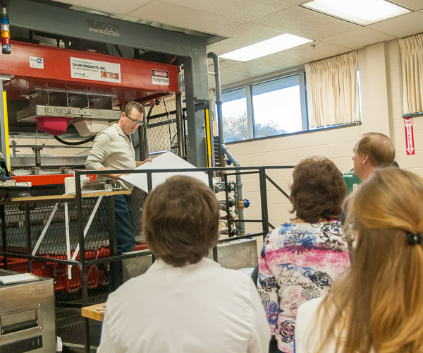 Tim Mallory, an engineering manager for Custom Tool & Design, a plastics company in the Erie area, pinch hits in describing the workings of the college’s thermoformer. Mallory's wife, Suzanne, is a 1982 dietetic technician alumna of WACC.