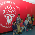 Eager and energetic young friends have fun at Firetree Place.