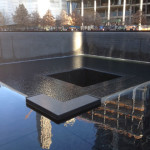 One of the site's two memorial pools shimmers in the footprint of the original Twin Towers.