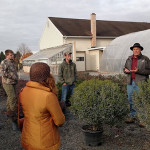 Matt R. Gingerich shows students the Erb Brothers container nursery area.