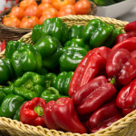 Red and green peppers are among the fresh produce for sale ...