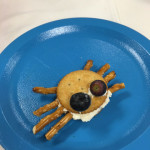 "Come into my parlor," says this spider, fashioned from honey whole-grain crackers, pretzel rods, fresh blueberries and reduced-fat cream cheese with crushed pineapple.